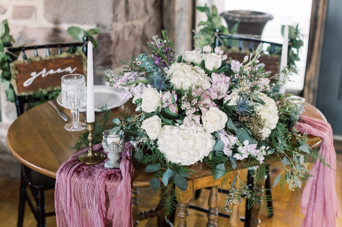 floral couples table at Bear Mill Estate wedding venue
