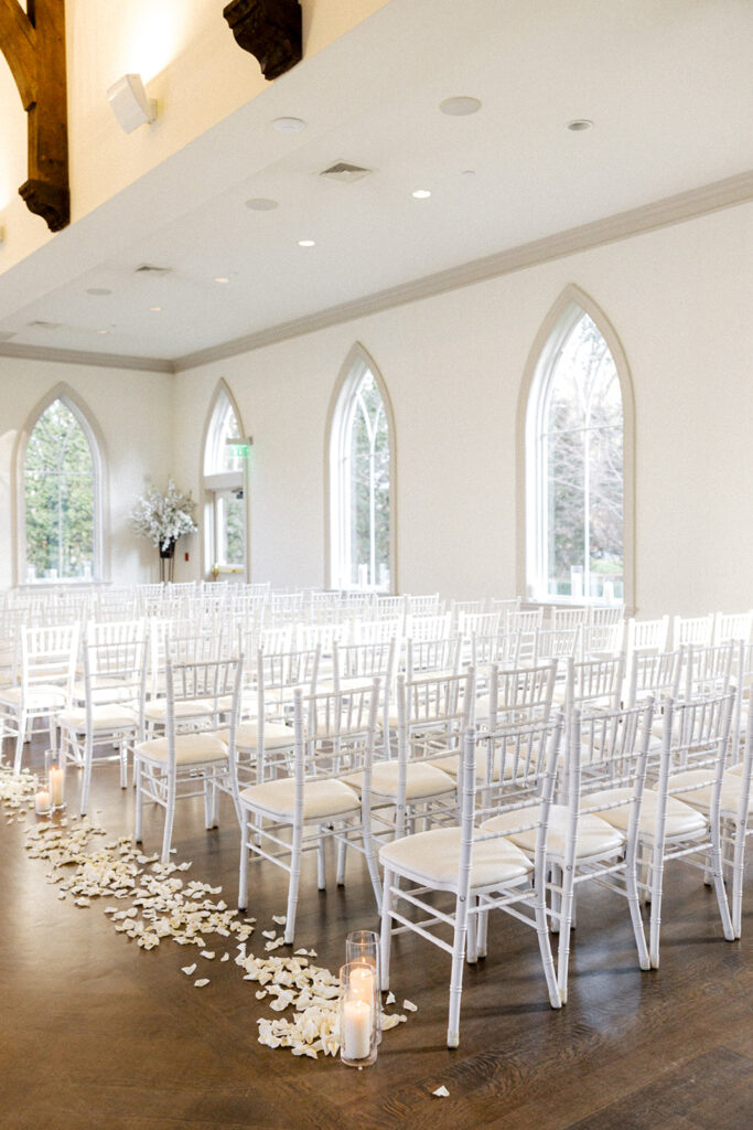 Interior photo of the chapel set up for a wedding ceremony at French style Park Chateau wedding venue  in New Jersey | Photo by Lindsey Ford Photography