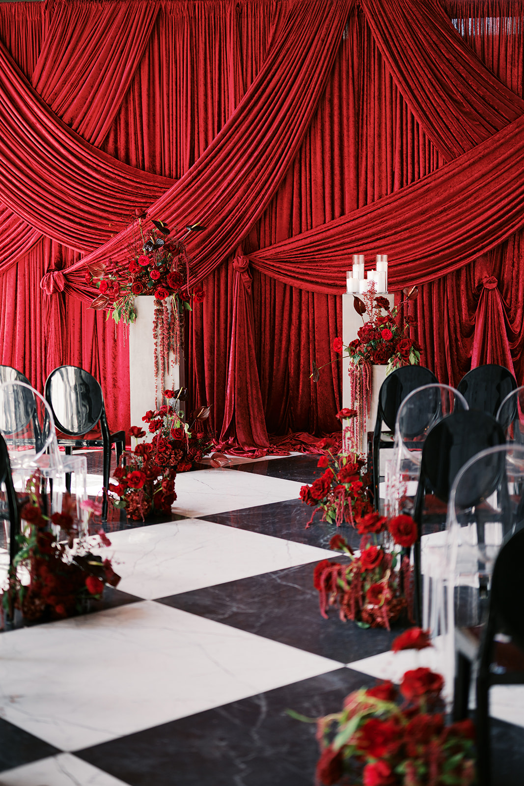 Dark red drape wedding ceremony backdrop