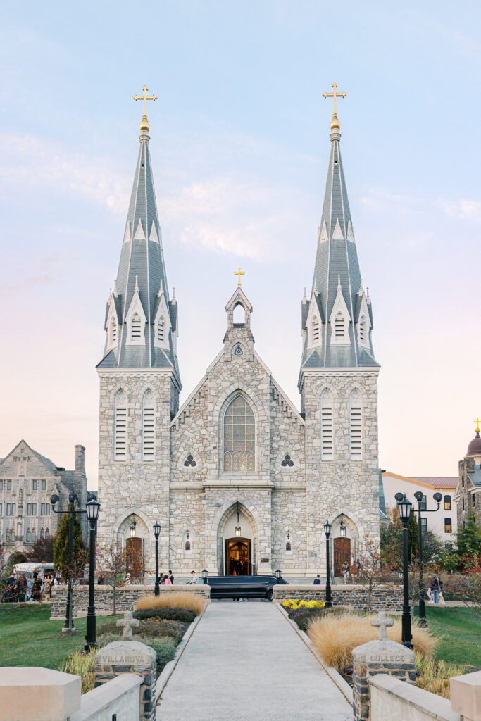 Magnificent stone church with two steeples in the Gothic architectural style on the Villanova University campus