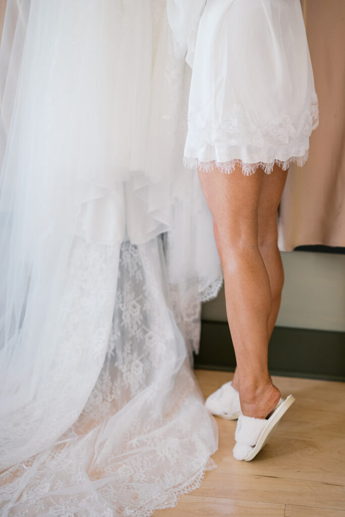 Bride getting ready detail white robe lace trim Lake House Inn bridal suite Pennsylvania