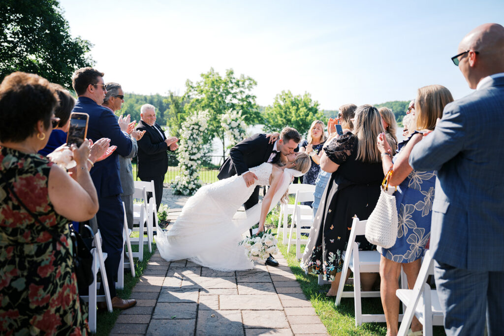 Romantic ceremony exit kiss nontraditional wedding pictures Lake House Inn
