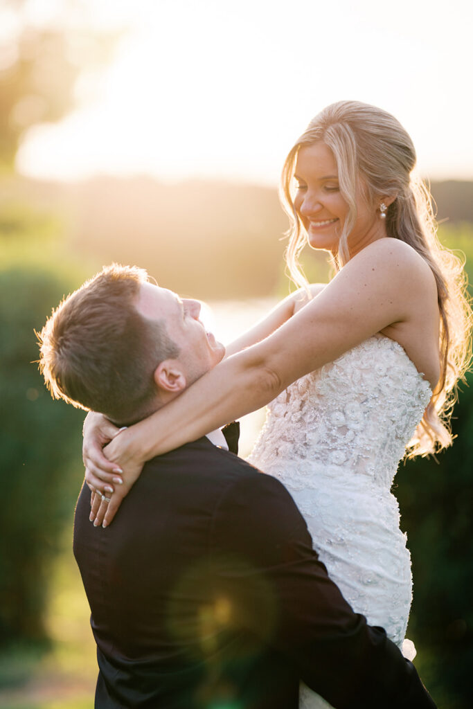 Stunning golden hour couple embrace backlit portrait nontraditional wedding pictures Lake House Inn Perkasie Pennsylvania
