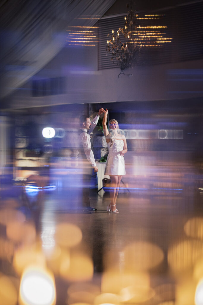 Creative motion blur dance photo with bokeh lighting nontraditional wedding pictures Lake House Inn Pennsylvania