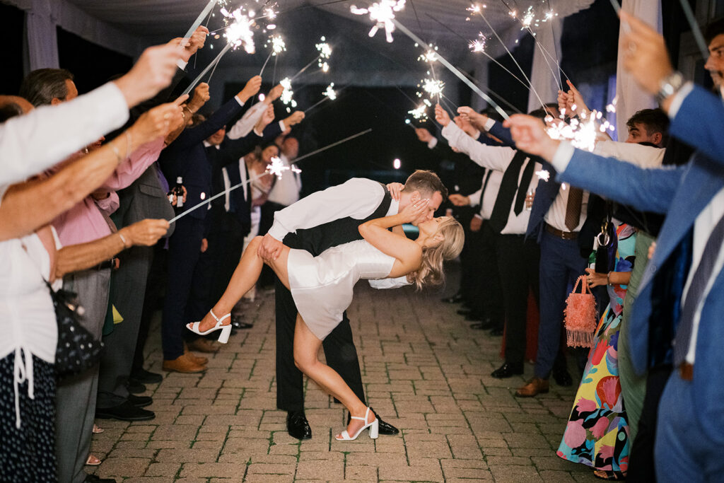 Romantic sparkler exit with dramatic dip nontraditional wedding photography Lake House Inn Perkasie PA